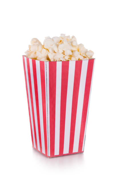 istock Popcorn in red and white cardboard box isolated on white background 1189975360