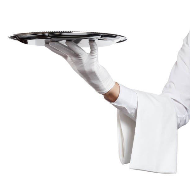 istock Waiter hand holding silver tray on white 1189976590