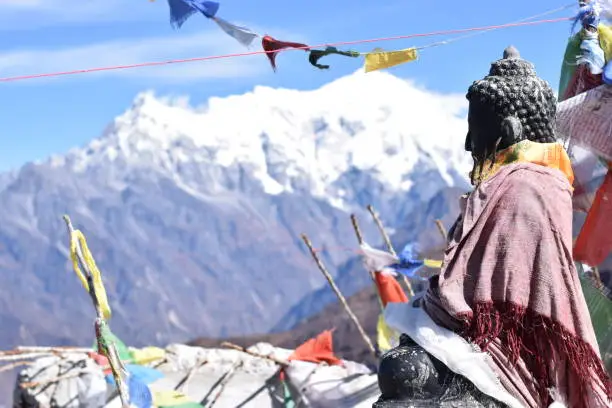 Buddha statue atop a mountain in the Langtang National Park, Nepal