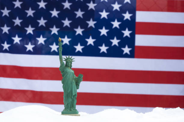 istock statue of Liberty,USA flag 1189978272