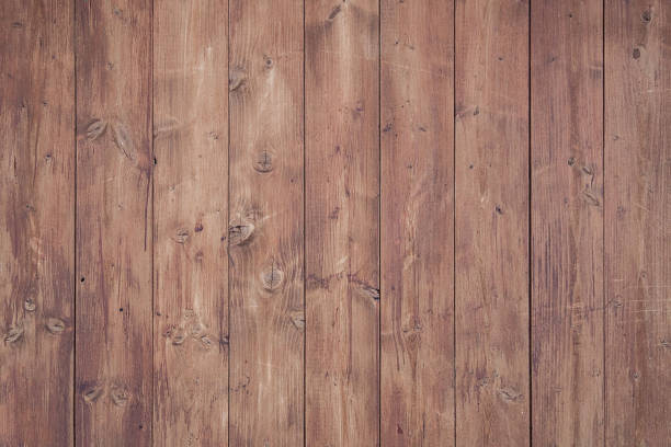 istock Wooden floor with brown Board texture and red tint 1189979077