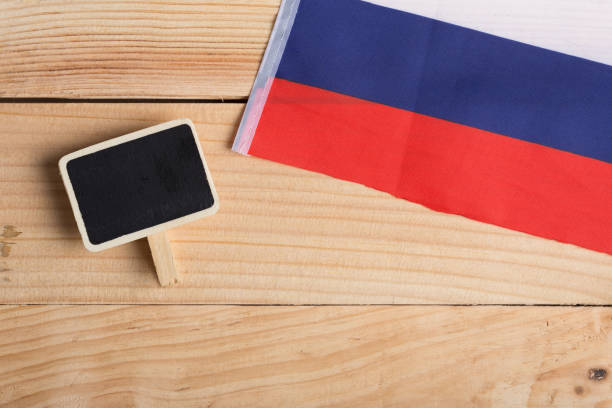 istock Russia Flag and blank blackboard. Copy space 1189980030