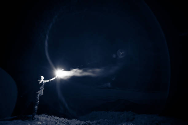 istock The male standing with a bright firework stick 1189984413