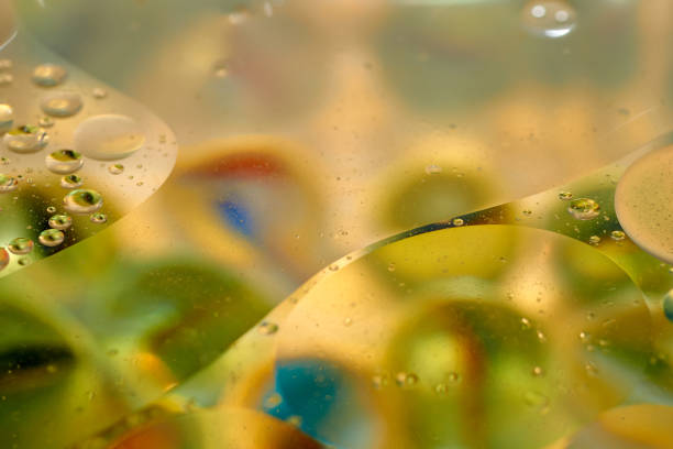 istock floating in the water abstract colorful oil drops. 1189984651