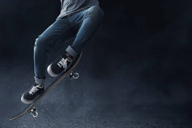 istock Skateboarder skateboarding on the street 1189985390