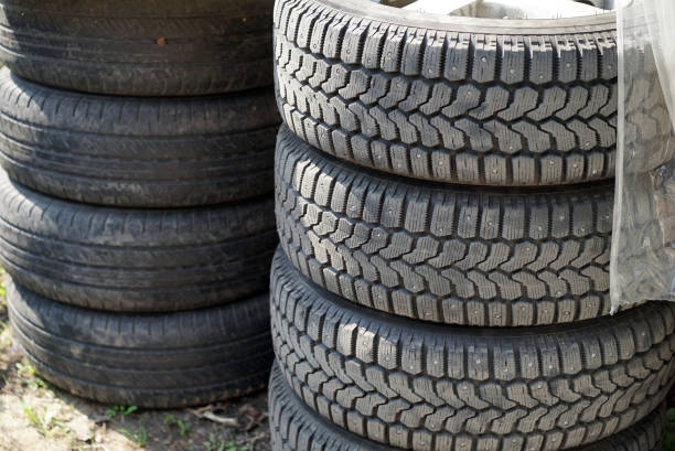 istock Stack of used car tires 1189986690