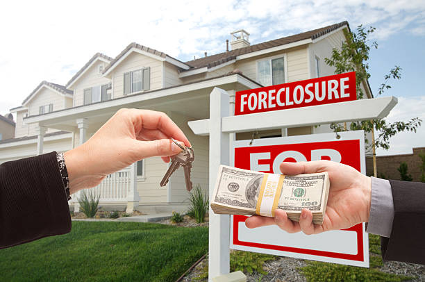 istock Handing Over Cash For House Keys 118998852