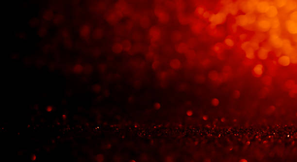 istock Defocused red abstract lights background with Christmas background 1189991781