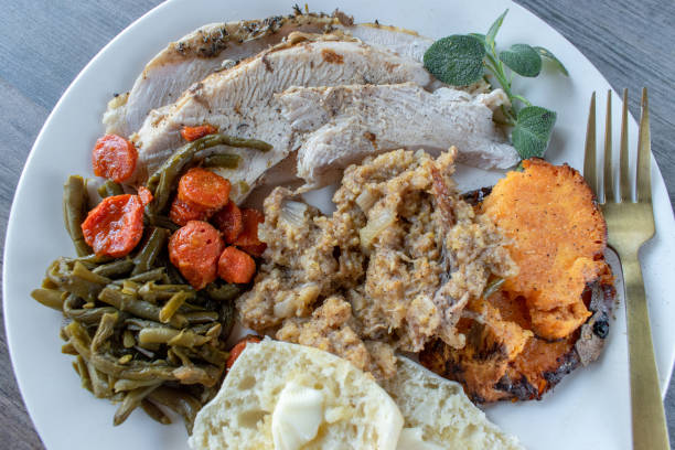 istock Plated roasted turkey, stuffing, and sides 1189993339