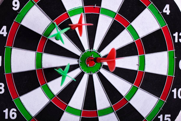 istock Darts arrows in the target center 1189993513