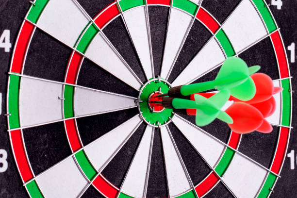 istock Darts arrows in the target center 1189993516