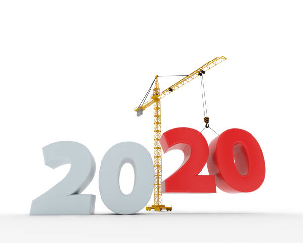 istock New 2020 year construction background with tower crane 1189994232