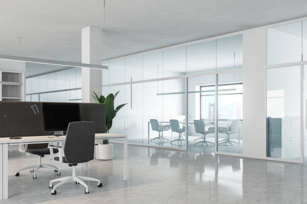 istock Modern white and glass open space office corner 1189995174
