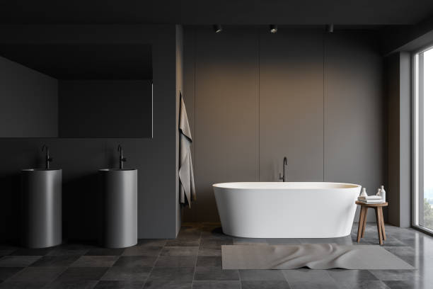 istock Gray bathroom interior with double round sink 1189995978