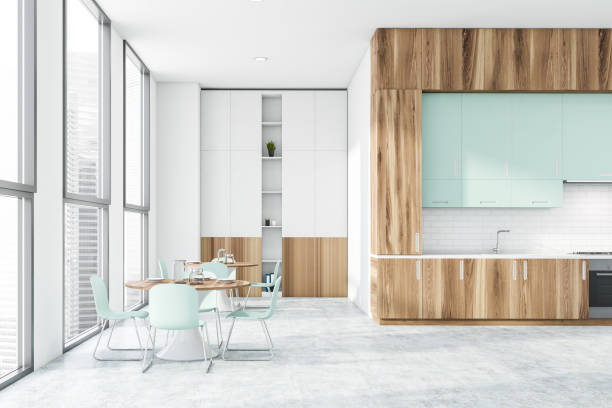 istock Wood and white kitchen with countertops and table 1189996312