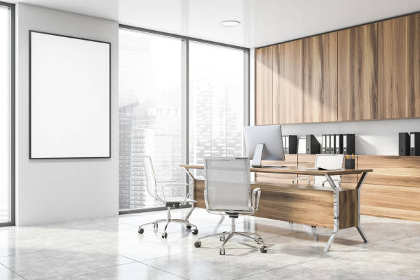 istock White and wooden CEO office corner with poster 1189997377