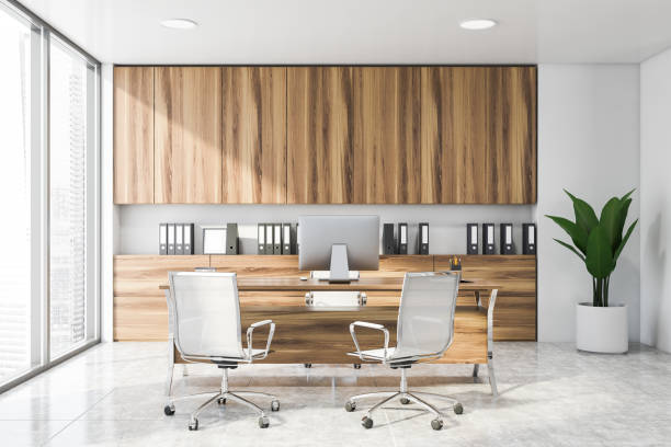 istock Stylish white and wooden CEO office interior 1189997968