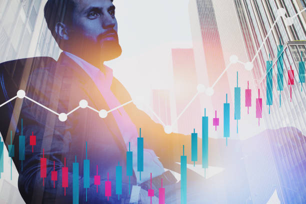istock Serious young manager in city, forex graph 1189998219