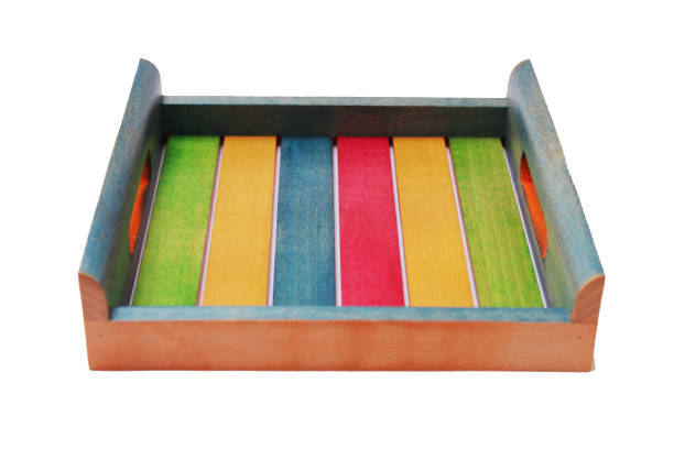 Empty wooden tray with dual color tone isolated on white background.