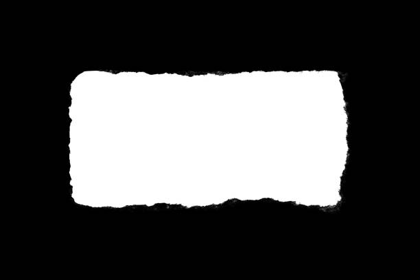 istock Hole in black paper with torn edges isolated with a white isolated background inside. 1190001538