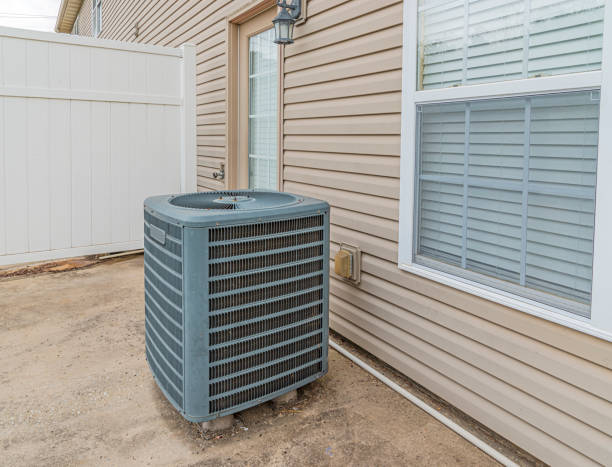 istock Old Air Conditioning Unit Behind Condo 1190001888
