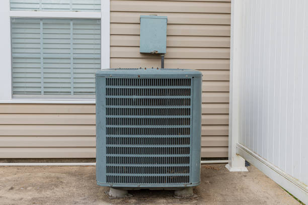istock Old Air Conditioning Unit On Condo Patio 1190001903