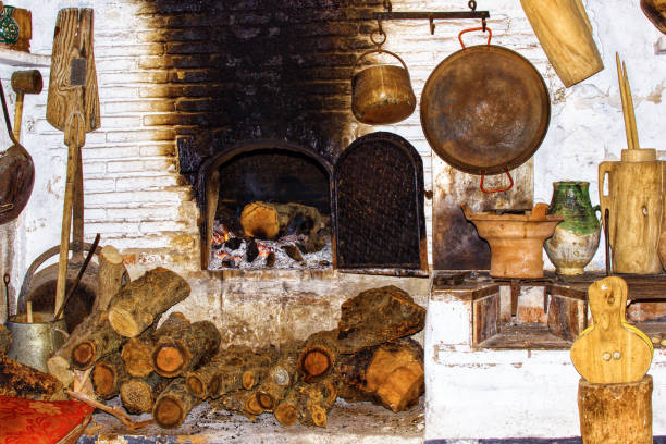istock Traditional fireplace to sit nearby during a cold winter. Old chimney 1190004183