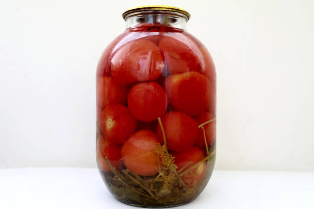 istock Jar of canned tomatoes 1190005497