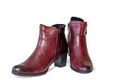 modern women's ankle boots rich red-brown color isolated on a white background.