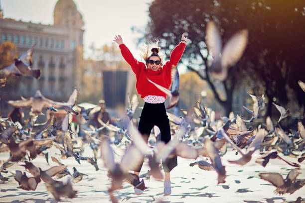 istock Happy girl is jumping from joy 1190009472