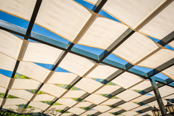 istock Textile roof shade structure. Outdoor canapies and shade structure 1190010029
