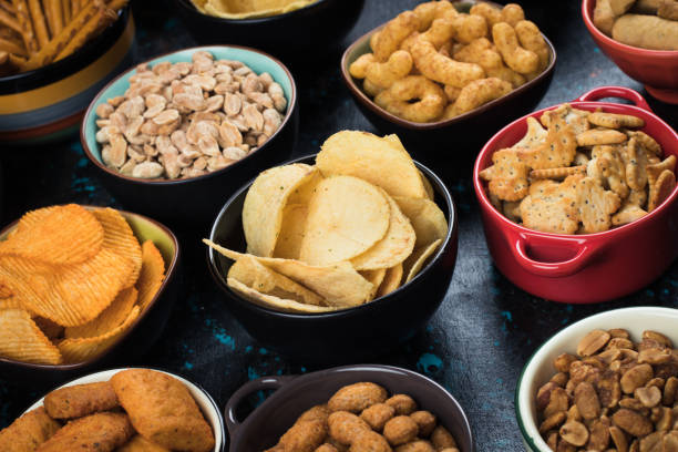 istock Salty snacks served in bowls 1190018225
