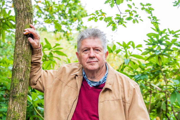 istock Active senior man in countryside portrait 1190023686
