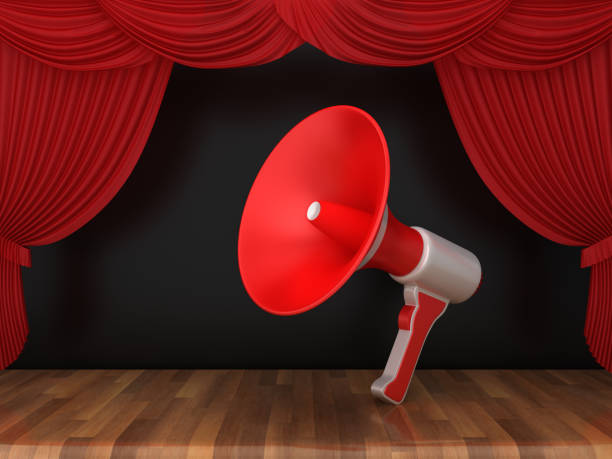 istock Megaphone with Red Stage Curtains on Wood Floor - 3D Rendering 1190027783