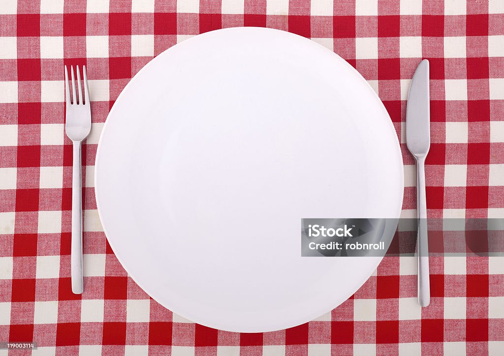 Tischtuch mit Gabel, Messer und leere Platte - Lizenzfrei Abnehmen Stock-Foto