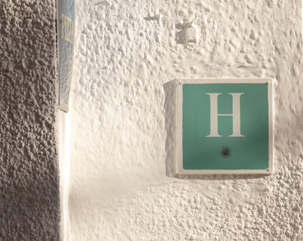 istock one star hotel sign on white wall 1190031194