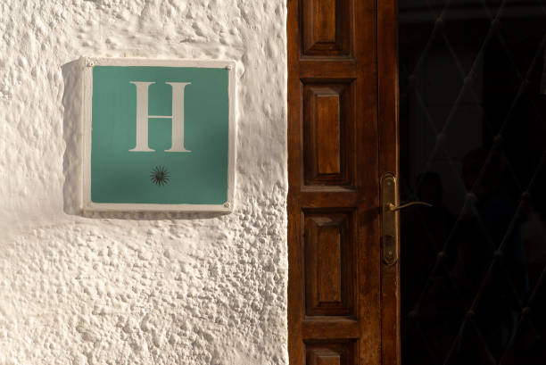 istock one star hotel sign on white wall 1190031229