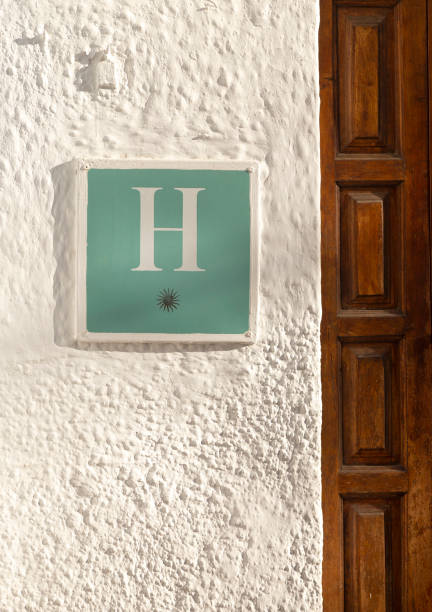 istock one star hotel sign on white wall 1190031754