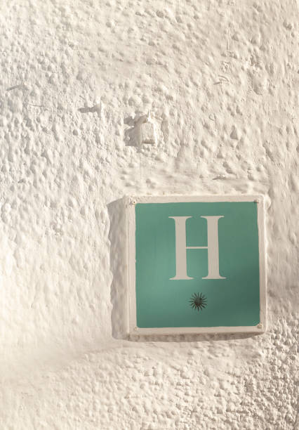 istock one star hotel sign on white wall 1190031787