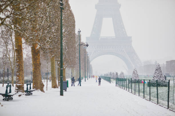 istock Scenic view to the Eiffel tower on a day with heavy snow 1190031936