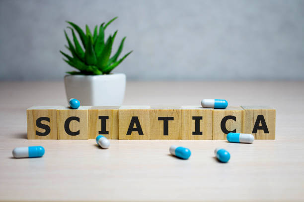 istock Wooden cube with text Sciatica. Medical concept. background 1190034069