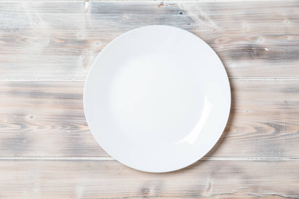 istock A wooden vintage Table or background with a plate 1190034917