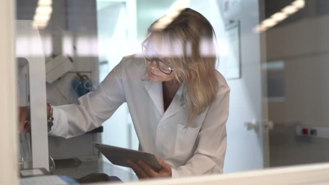Mature woman scientist working in laboratory