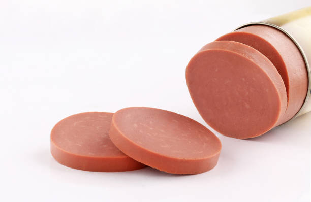 istock luncheon Mortadella meat slice cut on white background 1190045284