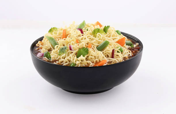 istock bowl noodles with vegetables on white background 1190045314