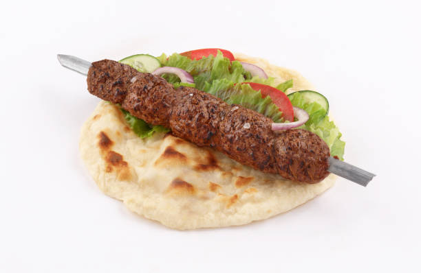 istock Indian shish kofta naan donner kebab sandwich on white background 1190045356