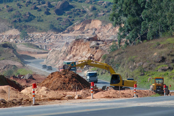 Row of road construction machinery on the construction of highway S6, Szczecin, Poland