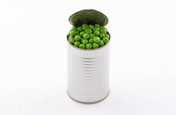 istock Open tin cans  Peas  high view on white background 1190045555