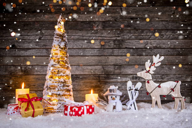 istock Christmas decoration on wooden background 1190045597