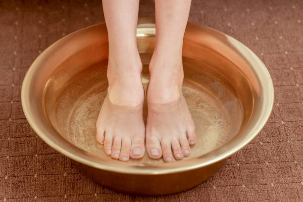 istock Beautiful legs care in bowl 1190046346